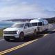 The Ford F-150 Lightning towing a trailer full of sales receipts
